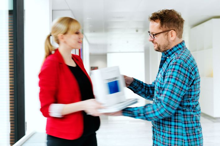 TRUMPF employees talking to each other